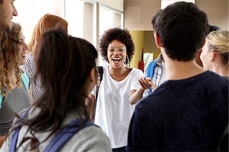 simsearch:614-06973669,k - Students chatting together in school corridor Stock Photo - Premium Royalty-Free, Code: 632-09158029