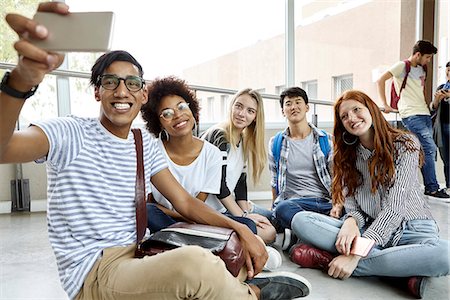 simsearch:632-07674444,k - Student taking selfie with classmates Stock Photo - Premium Royalty-Free, Code: 632-09158036
