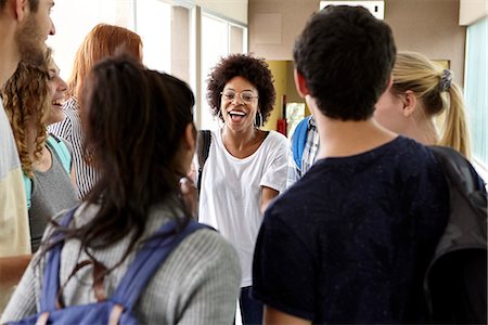 simsearch:614-06973669,k - Students chatting together in school corridor Stock Photo - Premium Royalty-Free, Code: 632-09158030