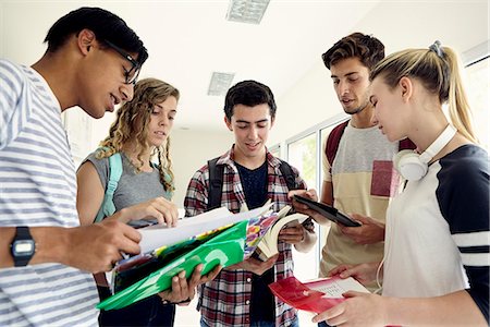simsearch:614-06973669,k - Group of students studying together in school corridor Stock Photo - Premium Royalty-Free, Code: 632-09158073