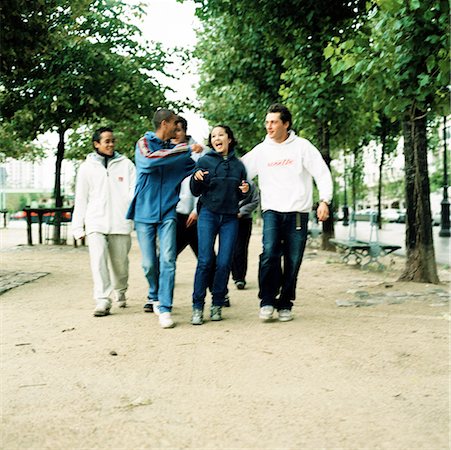 simsearch:695-03382482,k - Group of teenagers walking in park side by side Stock Photo - Premium Royalty-Free, Code: 632-01137082