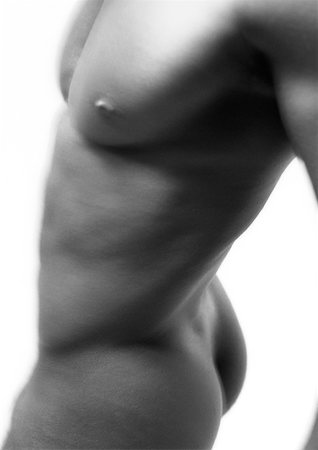 six-pack - Man's bare torso, view from the side, close up, b&w Stock Photo - Premium Royalty-Free, Code: 632-01137487