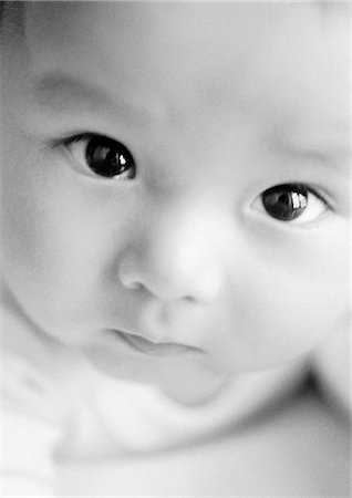 simsearch:632-03027302,k - Baby looking up at camera, close-up, B&W. Stock Photo - Premium Royalty-Free, Code: 632-01138786