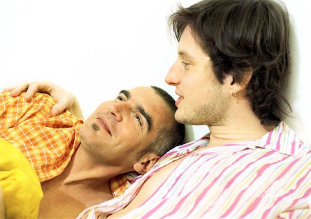 picture of gay men embracing - Two men, one with arm around the other, portrait. Stock Photo - Premium Royalty-Free, Code: 632-01144064