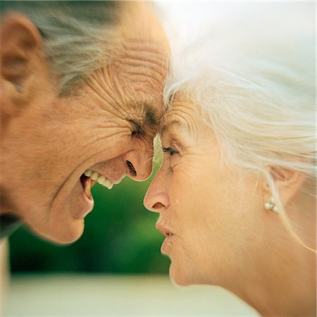 Senior couple arguing, foreheads touching, close-up Stock Photo - Premium Royalty-Free, Code: 632-01144218