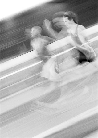 Male athletes running fast, blurred motion, b&w Stock Photo - Premium Royalty-Free, Code: 632-01145071