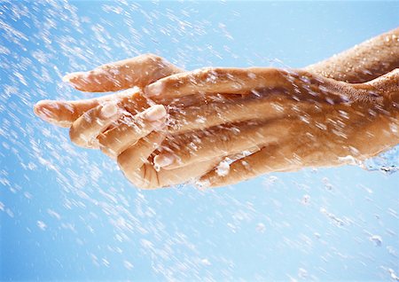 simsearch:632-05816631,k - Hands under drops of water, close up Stock Photo - Premium Royalty-Free, Code: 632-01146600