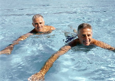 Two mature men in swimming pool, smiling Stock Photo - Premium Royalty-Free, Code: 632-01146651