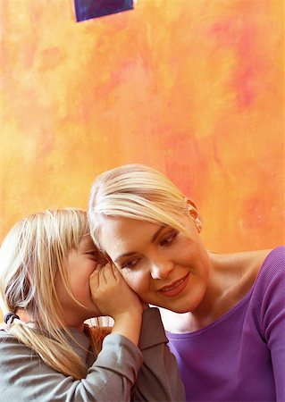 pictures of a little girl whispering - Daughter whispering to mother. Stock Photo - Premium Royalty-Free, Code: 632-01148288