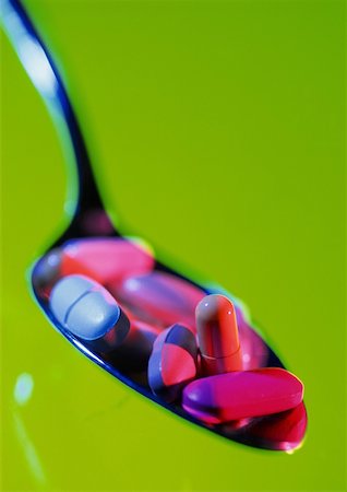 Various pills in spoon, close-up Stock Photo - Premium Royalty-Free, Code: 632-01140458