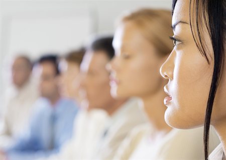 simsearch:632-05604001,k - Group of executives in meeting, side view, focus on woman in foreground Stock Photo - Premium Royalty-Free, Code: 632-01155767