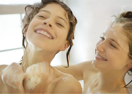 Two girls bathroom fan photos