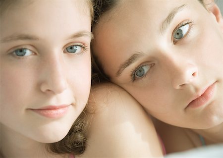 simsearch:695-03376367,k - Two preteen girls, one with head on other's shoulder Stock Photo - Premium Royalty-Free, Code: 632-01156733