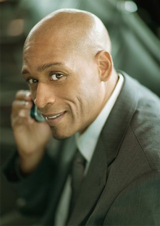 simsearch:695-03376228,k - Businessman using cell phone, portrait Stock Photo - Premium Royalty-Free, Code: 632-01157684