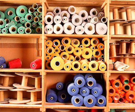 simsearch:693-06379747,k - Spools of weaving thread on shelves Stock Photo - Premium Royalty-Free, Code: 632-01158116