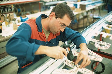 pasting - Manual worker Stock Photo - Premium Royalty-Free, Code: 632-01158255