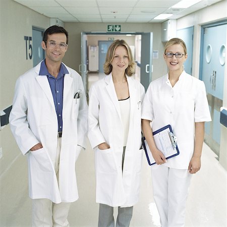doctor intern male white - Medical staff standing in hospital corridor Stock Photo - Premium Royalty-Free, Code: 632-01152738