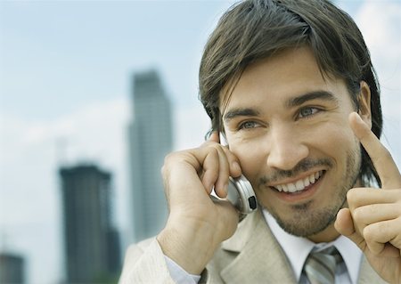 simsearch:695-03376228,k - Businessman using cell phone Stock Photo - Premium Royalty-Free, Code: 632-01160394