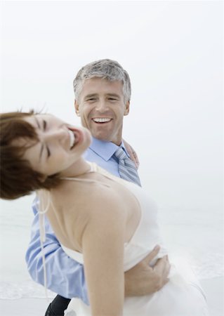 Couple dancing on beach Stock Photo - Premium Royalty-Free, Code: 632-01160668