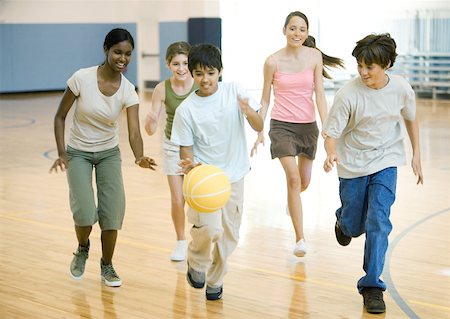 High school students playing basketball in school gym Stock Photo - Premium Royalty-Free, Code: 632-01161661