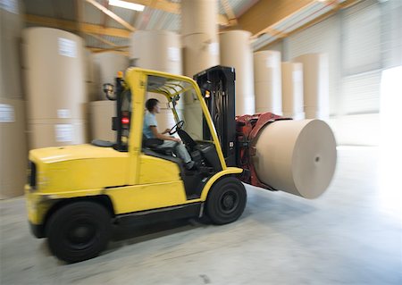 pulp and paper mill - Fork lift carrying roll of paper Stock Photo - Premium Royalty-Free, Code: 632-01162308