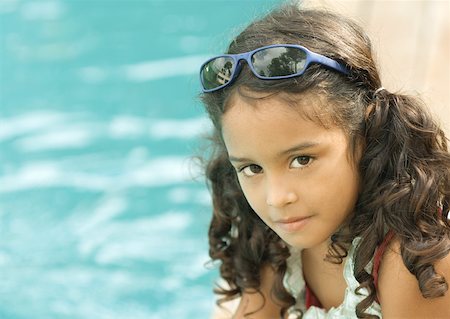 simsearch:632-01193783,k - Girl with sunglasses on head, pool in background Stock Photo - Premium Royalty-Free, Code: 632-01193783