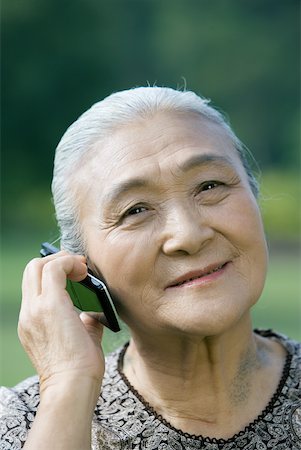 phone one person adult smile elderly - Senior woman using cell phone Stock Photo - Premium Royalty-Free, Code: 632-01270494