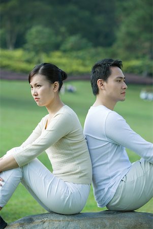 simsearch:632-01148228,k - Couple sitting back to back Stock Photo - Premium Royalty-Free, Code: 632-01271062