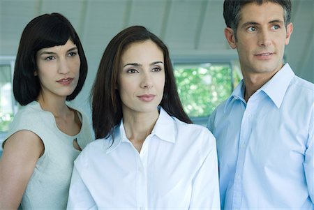 simsearch:632-05401320,k - Three business associates looking away, portrait, head and shoulders Stock Photo - Premium Royalty-Free, Code: 632-01613150