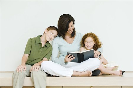 simsearch:632-05816381,k - Mother reading book to son and daughter Stock Photo - Premium Royalty-Free, Code: 632-01785413