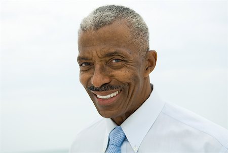 Senior man smiling at camera, portrait Stock Photo - Premium Royalty-Free, Code: 632-01828328