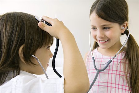 simsearch:695-05768235,k - Children playing with stethoscopes Stock Photo - Premium Royalty-Free, Code: 632-02227660