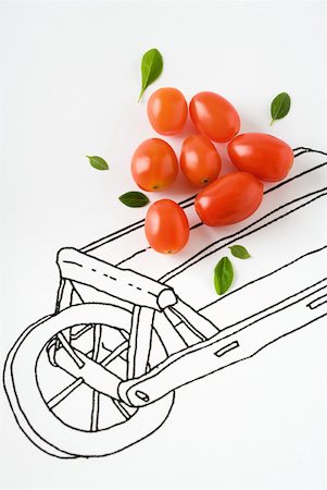 Roma tomatoes and basil leaves on drawing of cart Stock Photo - Premium Royalty-Free, Code: 632-02282794