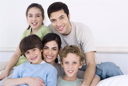 simsearch:695-05769087,k - Parents and three children smiling at camera, portrait Stock Photo - Premium Royalty-Free, Code: 632-02345193