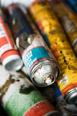 Discarded aerosol cans, close-up Stock Photo - Premium Royalty-Free, Code: 632-02690373