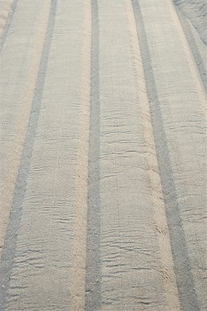 simsearch:633-01715488,k - Tire track on sand, close-up Stock Photo - Premium Royalty-Free, Code: 632-02745264