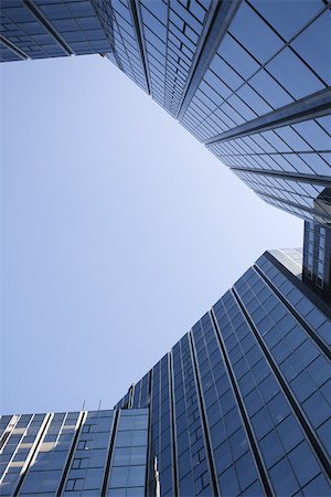 paris la defense - High rise office buildings against blue sky, viewed from below, cropped Stock Photo - Premium Royalty-Free, Code: 632-02885235