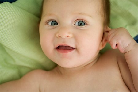 simsearch:632-03027302,k - Baby pulling on ear, smiling Stock Photo - Premium Royalty-Free, Code: 632-03027307