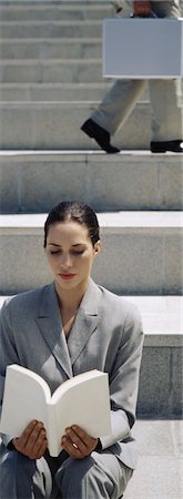 simsearch:632-03083042,k - Professionally dressed woman on steps reading book Stock Photo - Premium Royalty-Free, Code: 632-03083036