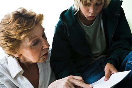 Grandmother helping grandson with homework Stock Photo - Premium Royalty-Free, Code: 632-03083152