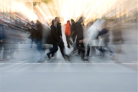 panning (camera technique) - Pedestrians crossing street, blurred Stock Photo - Premium Royalty-Free, Code: 632-03083480