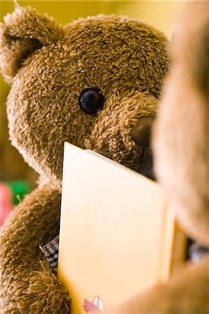 simsearch:632-03083700,k - Teddy bears placed face to face with book between them, cropped Stock Photo - Premium Royalty-Free, Code: 632-03083615