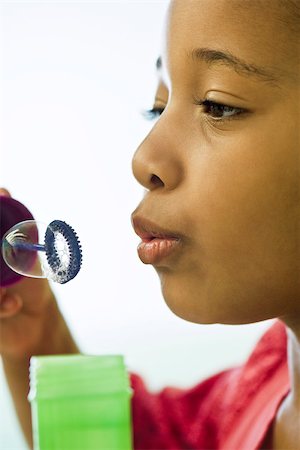 simsearch:632-05604245,k - Girl blowing bubbles Stock Photo - Premium Royalty-Free, Code: 632-03083665