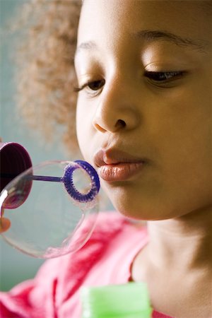 simsearch:632-05604245,k - Little girl blowing bubbles Stock Photo - Premium Royalty-Free, Code: 632-03083662