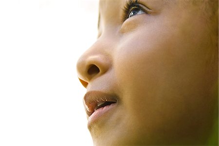 Little girl looking up, portrait Stock Photo - Premium Royalty-Free, Code: 632-03083696