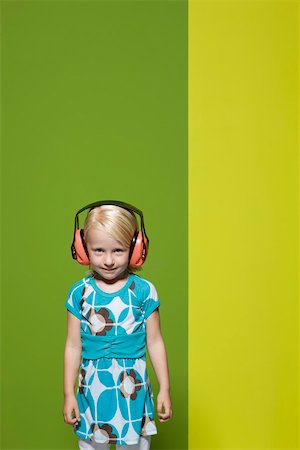 simsearch:632-01193783,k - Little girl wearing protective headphones Stock Photo - Premium Royalty-Free, Code: 632-03193352