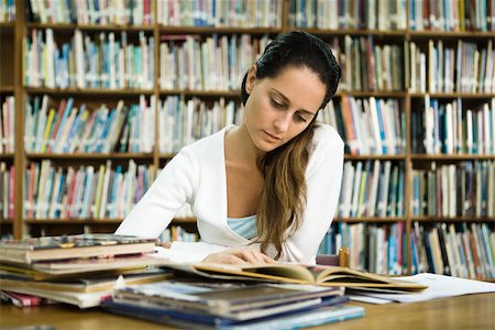 simsearch:632-03083700,k - Woman reading in library Stock Photo - Premium Royalty-Free, Code: 632-03403384
