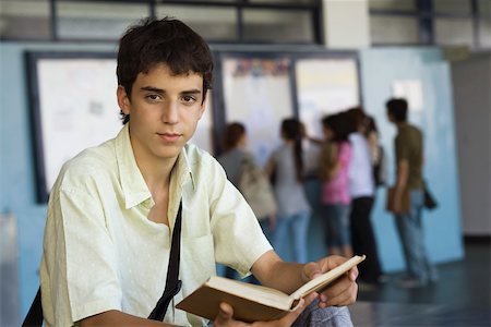 simsearch:632-03083700,k - Teenage boy reading book Stock Photo - Premium Royalty-Free, Code: 632-03424182