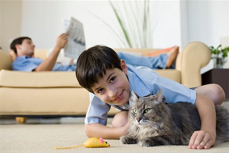 emotional attachment - Young boy with pet cat Stock Photo - Premium Royalty-Free, Code: 632-03424348