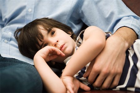 simsearch:695-03380694,k - Little boy resting with head in father's lap Stock Photo - Premium Royalty-Free, Code: 632-03424659